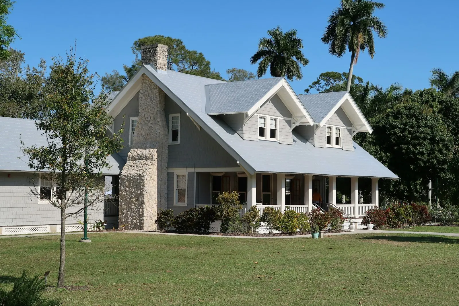 Rural home with a metal roof among trees near New Caney, Texas